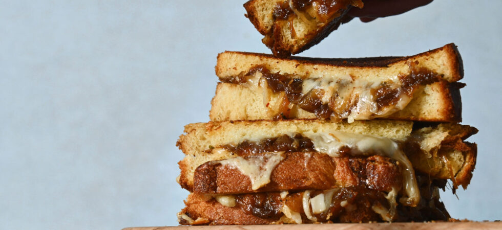 Caramelized Onion Grilled Cheese sandwiches stacked