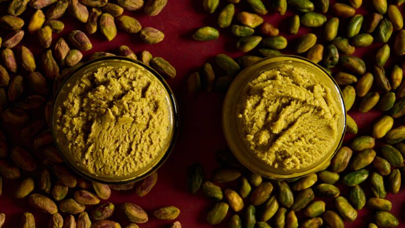 Pistachio paste in two jars, one with and one without skins. 
