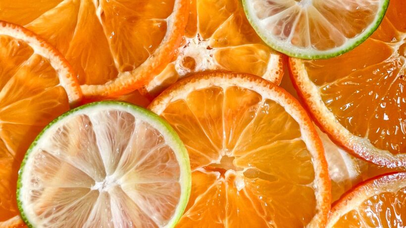 Fresh sliced citrus, oranges and limes.