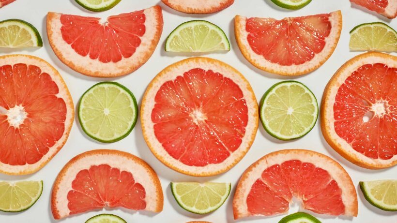 geometric pattern, hard-light image of sliced grapefruits and limes.