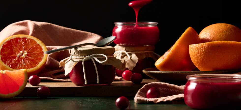 a scoop of cranberry sauce with orange juice