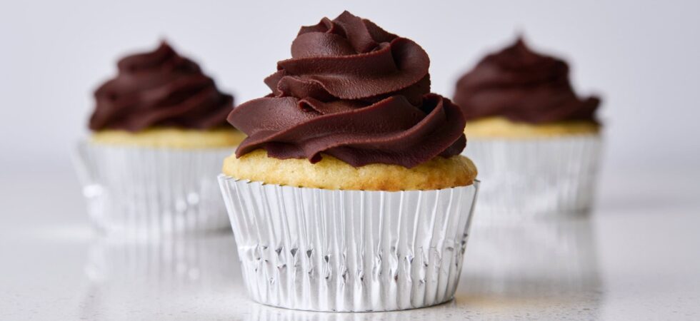Dark Chocolate Ganache Frosting topping 3 cupcakes