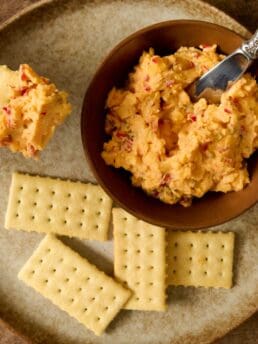 Pimento cheese recipe with cream cheese spread on a cracker